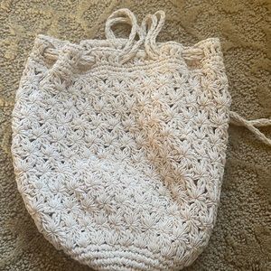 Versatile. Handbag cross body or backpack or clutch